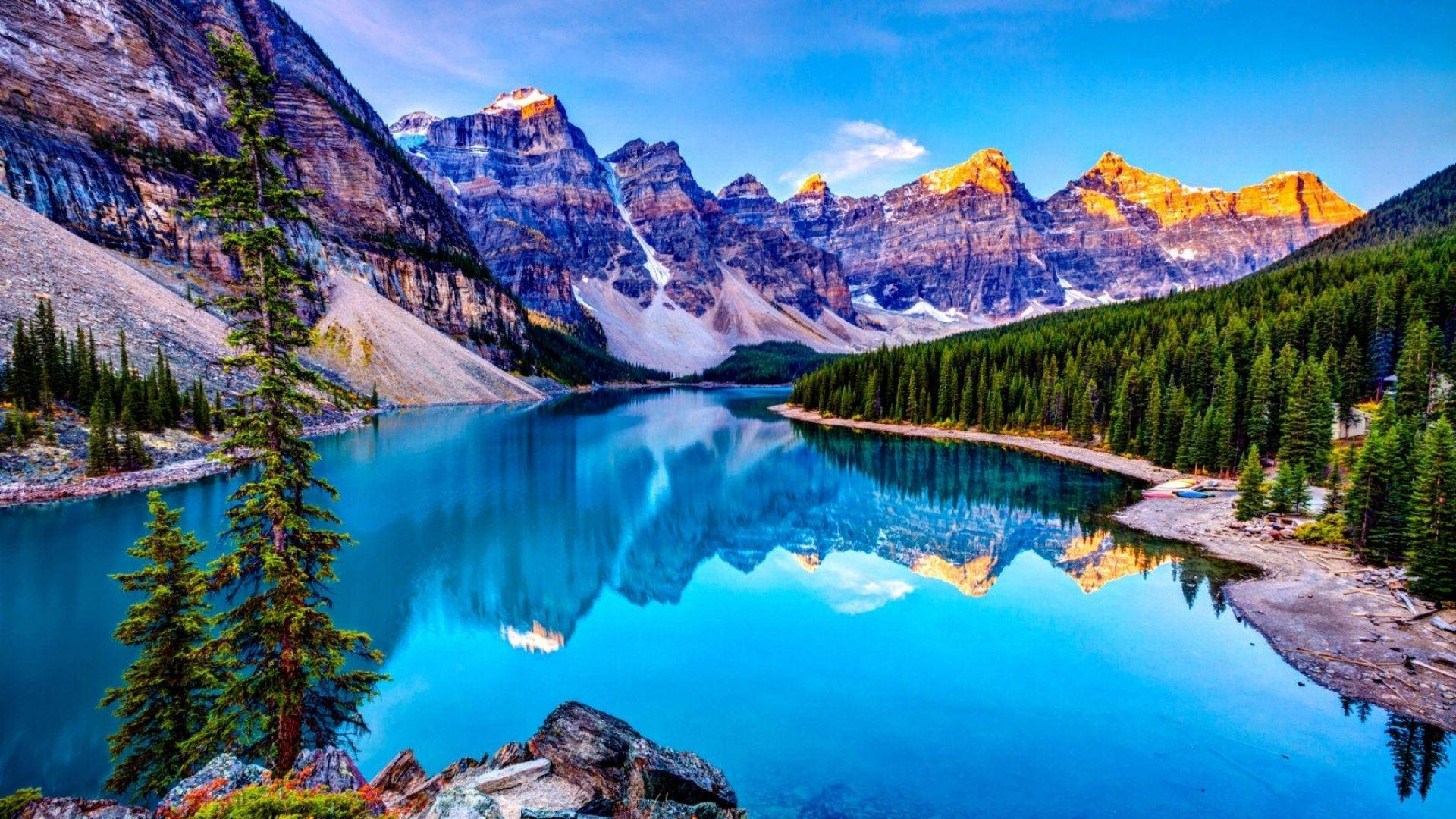Rocky Mountain With Majestic Blue Lake Wallpaper