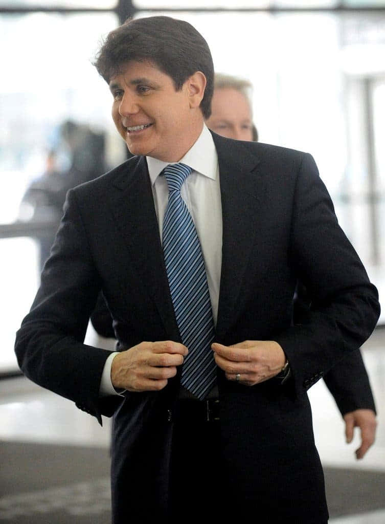 Rod Blagojevich Fixing Coat Button Wallpaper