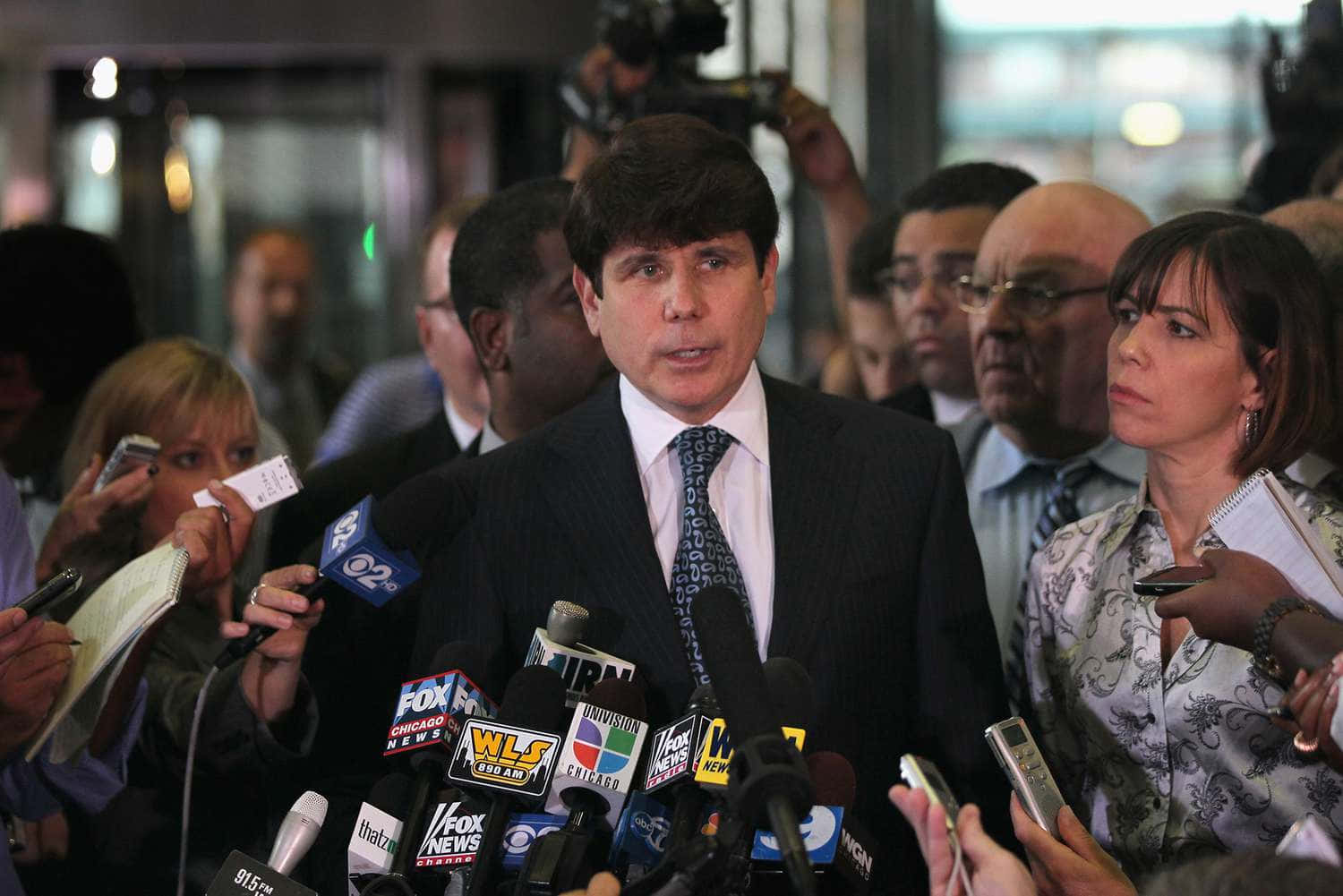 Rod Blagojevich Surrounded By Mics And Reporters Wallpaper