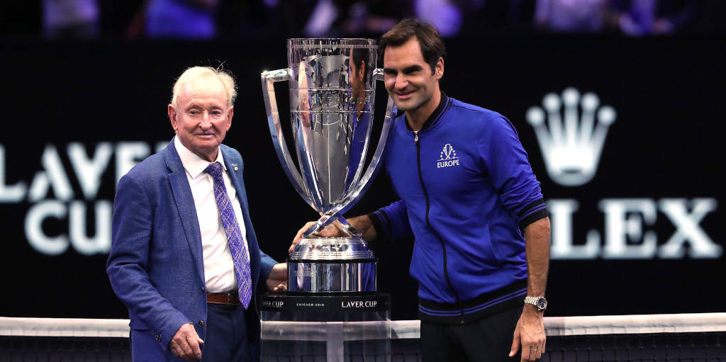 Rod Laver Trophy With Roger Federer Wallpaper