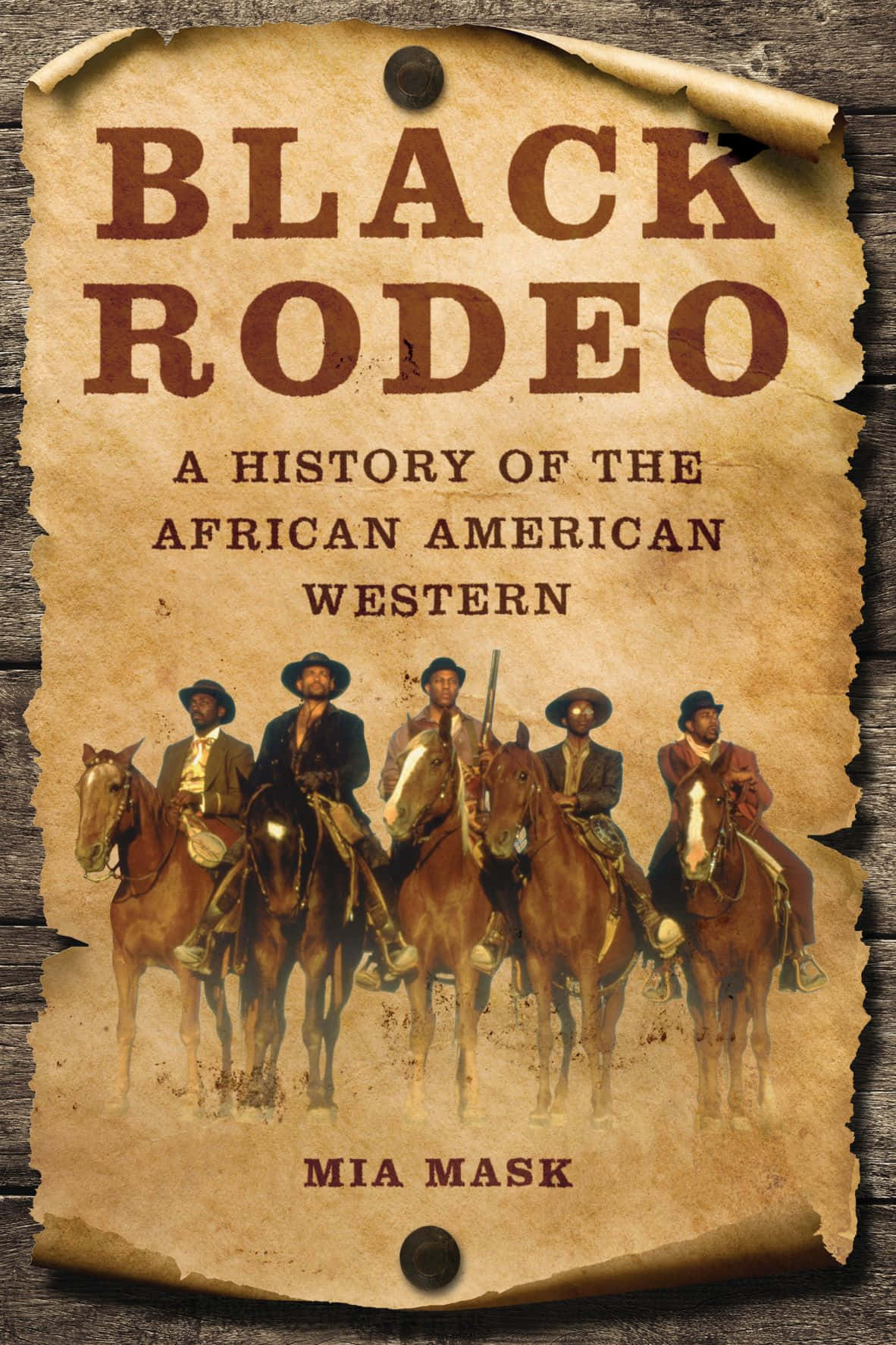 Rodeo Cowboy Riding Wild Horse
