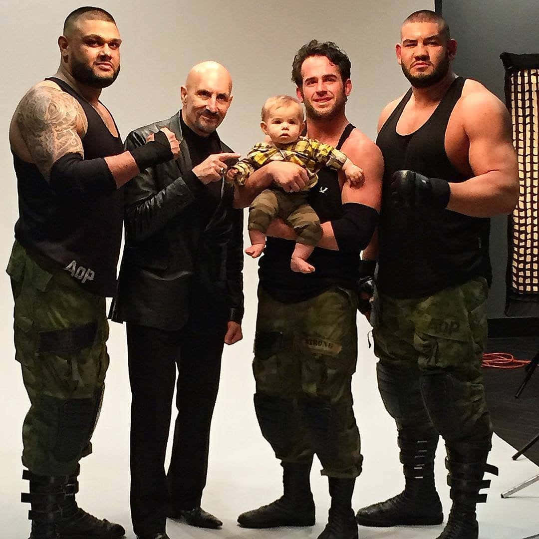 Roderick Strong With Paul Ellering And Authors Of Pain Wallpaper