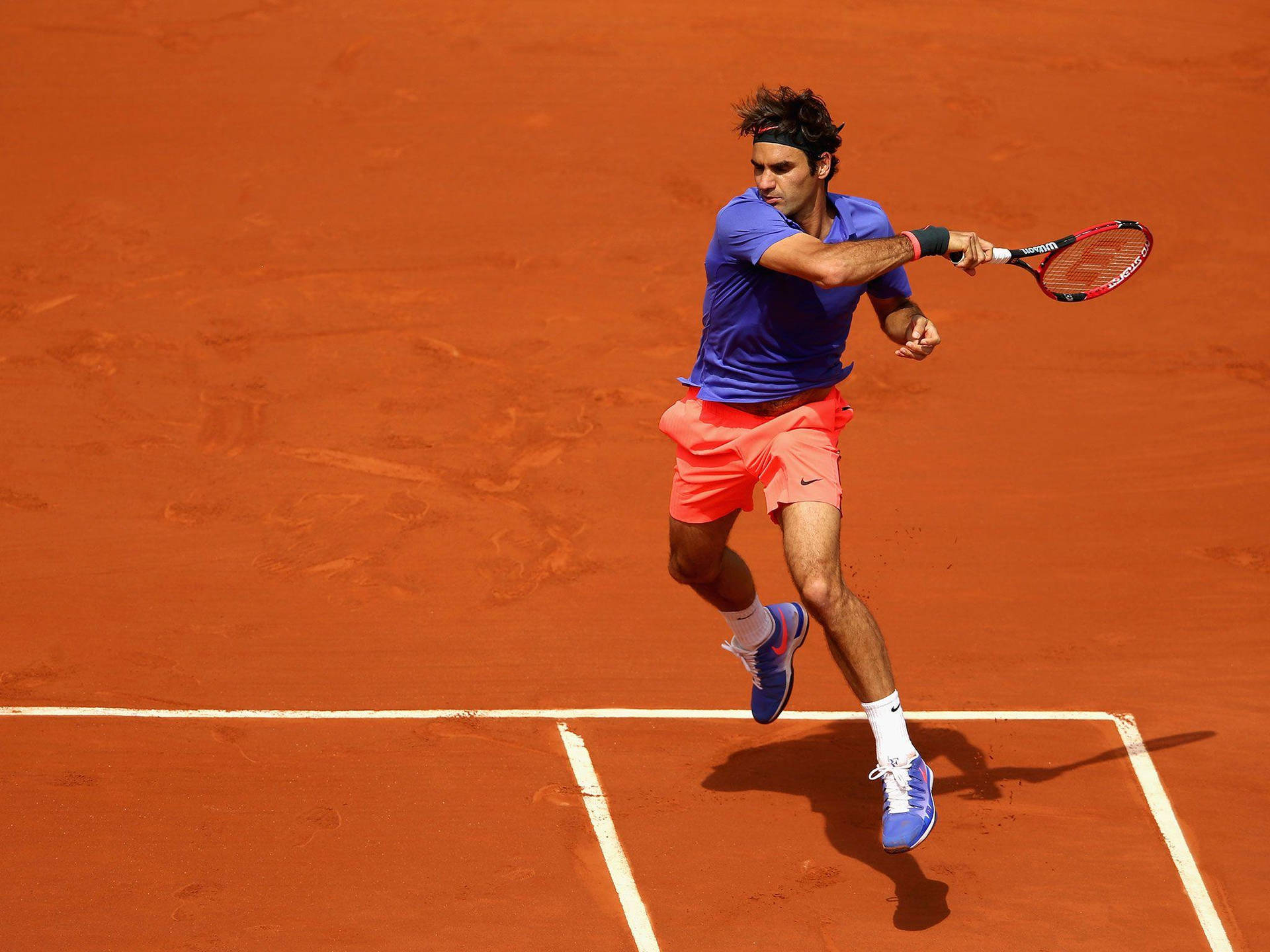 Roger Federer In French Open Event Wallpaper