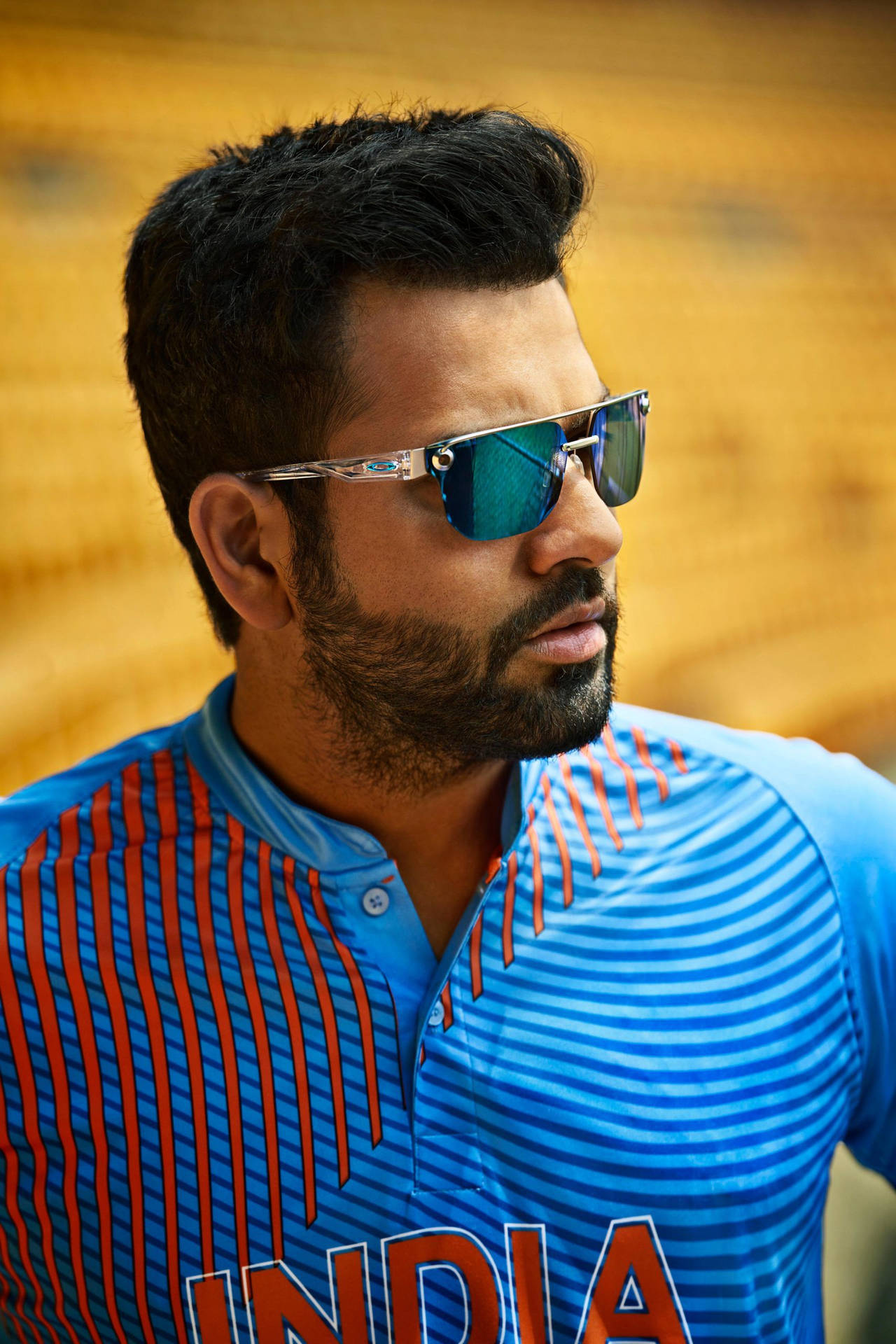 Rohitsharma, O Jogador De Críquete Indiano, Com Um Fundo Legal Da Oakley. Papel de Parede