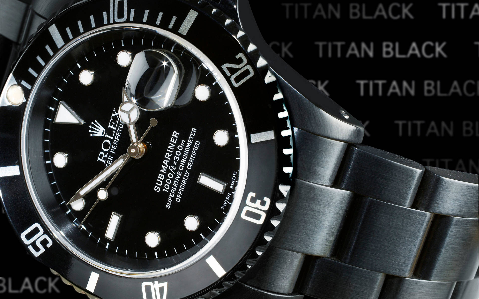 A Close-Up View of the Rolex Logo on a Submariner Watch Wallpaper
