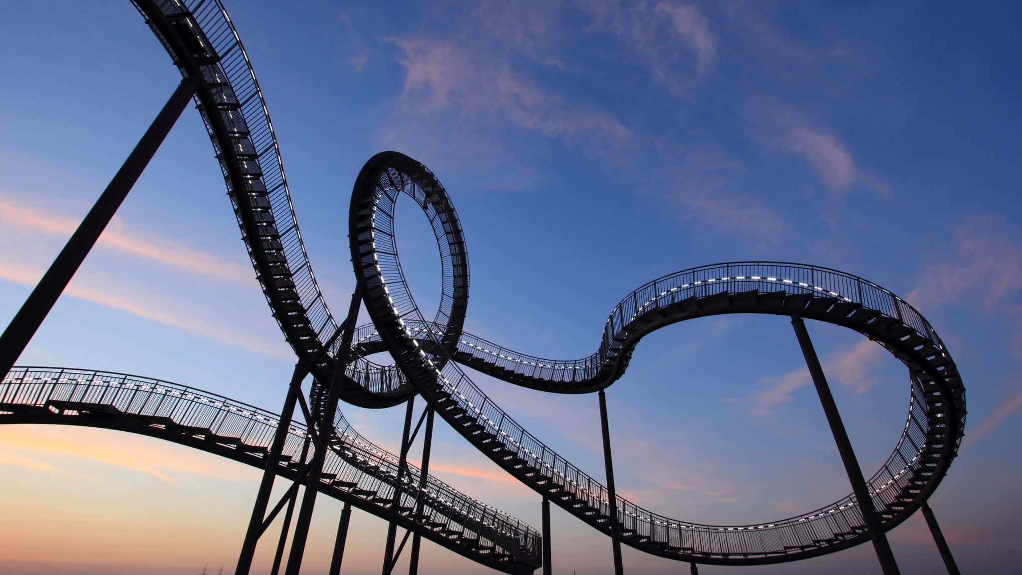 Thrilling Loop-the-loop Roller Coaster in Amusement Park