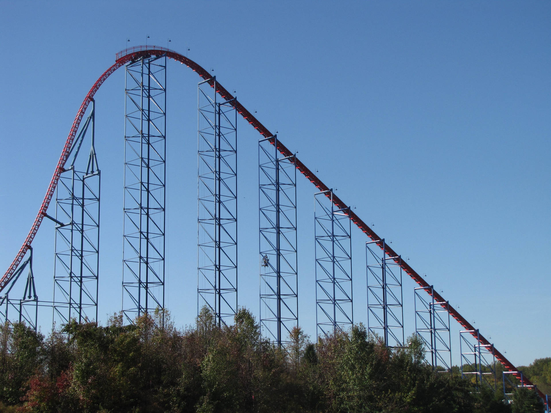 Roller Coaster With High Arching Hill Wallpaper
