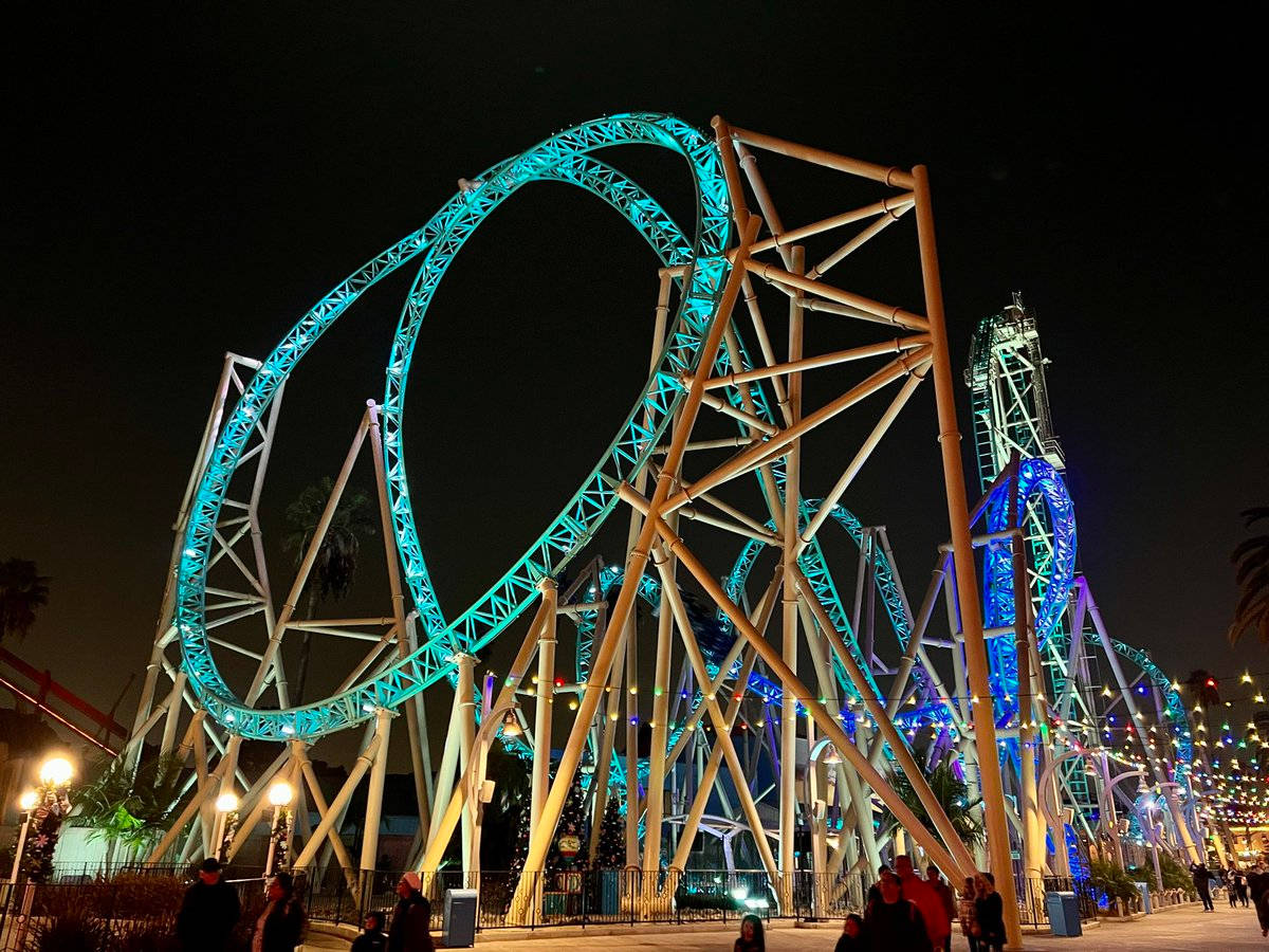 Roller Coaster With Teal Light Wallpaper