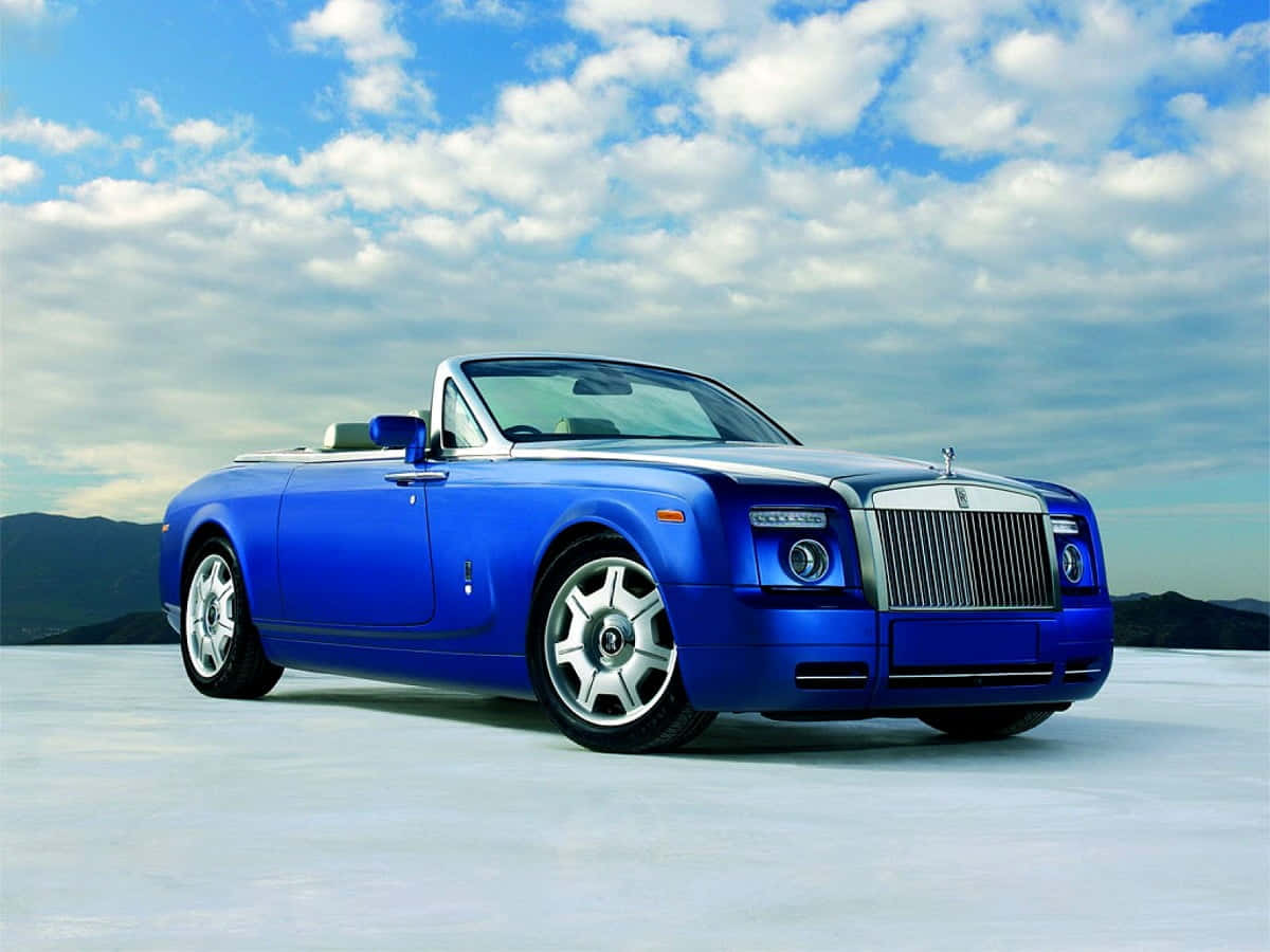 Caption: Luxurious Rolls Royce on Scenic Road