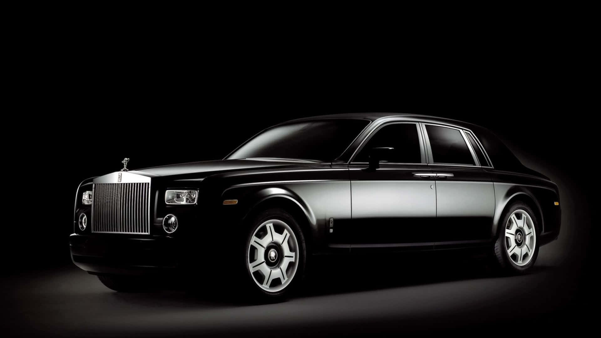 Elegant Rolls-Royce Luxury Vehicle Parked Beside Water