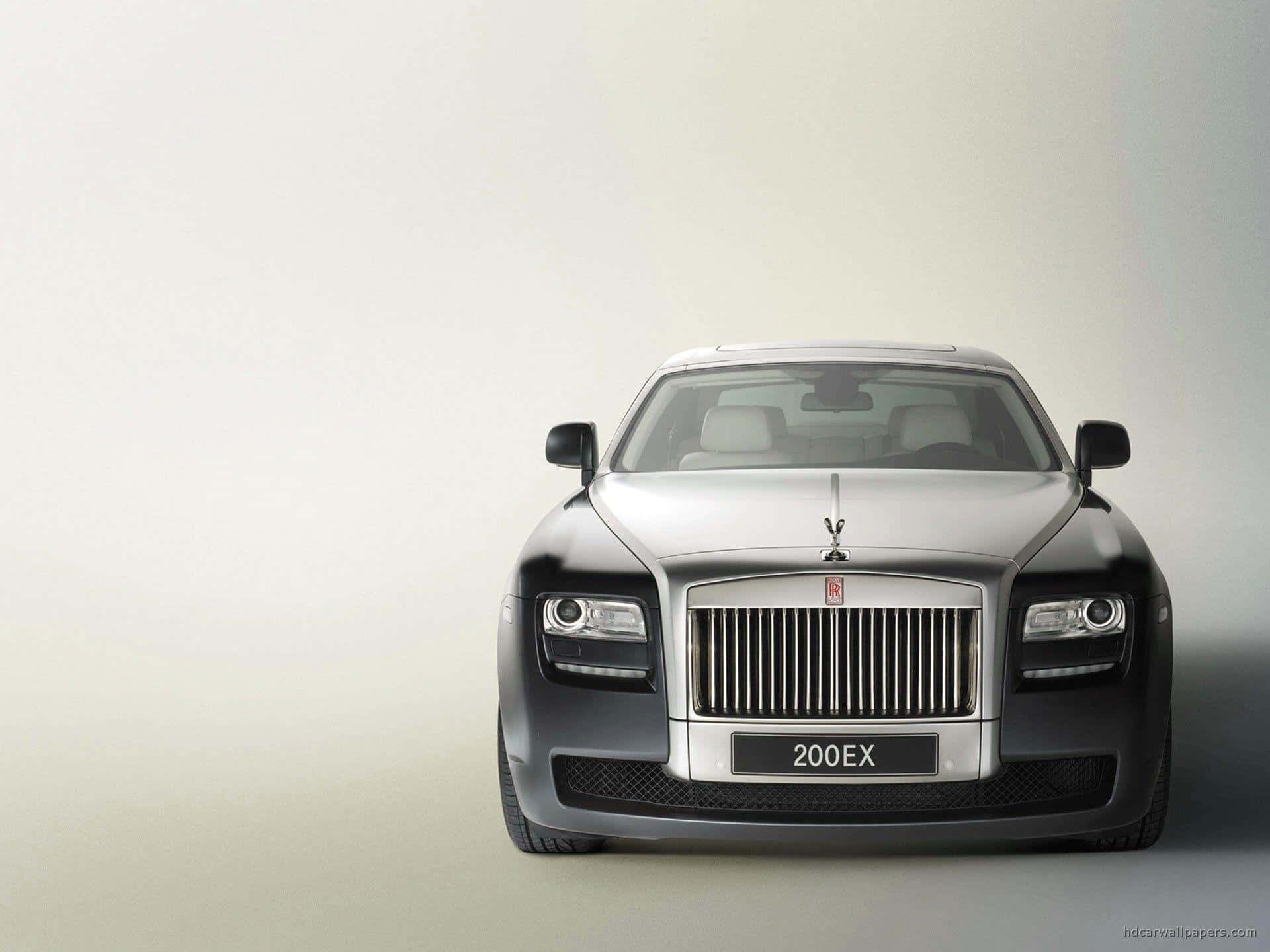 Caption: Elegant Rolls-Royce Luxury Car in a Classic Setting