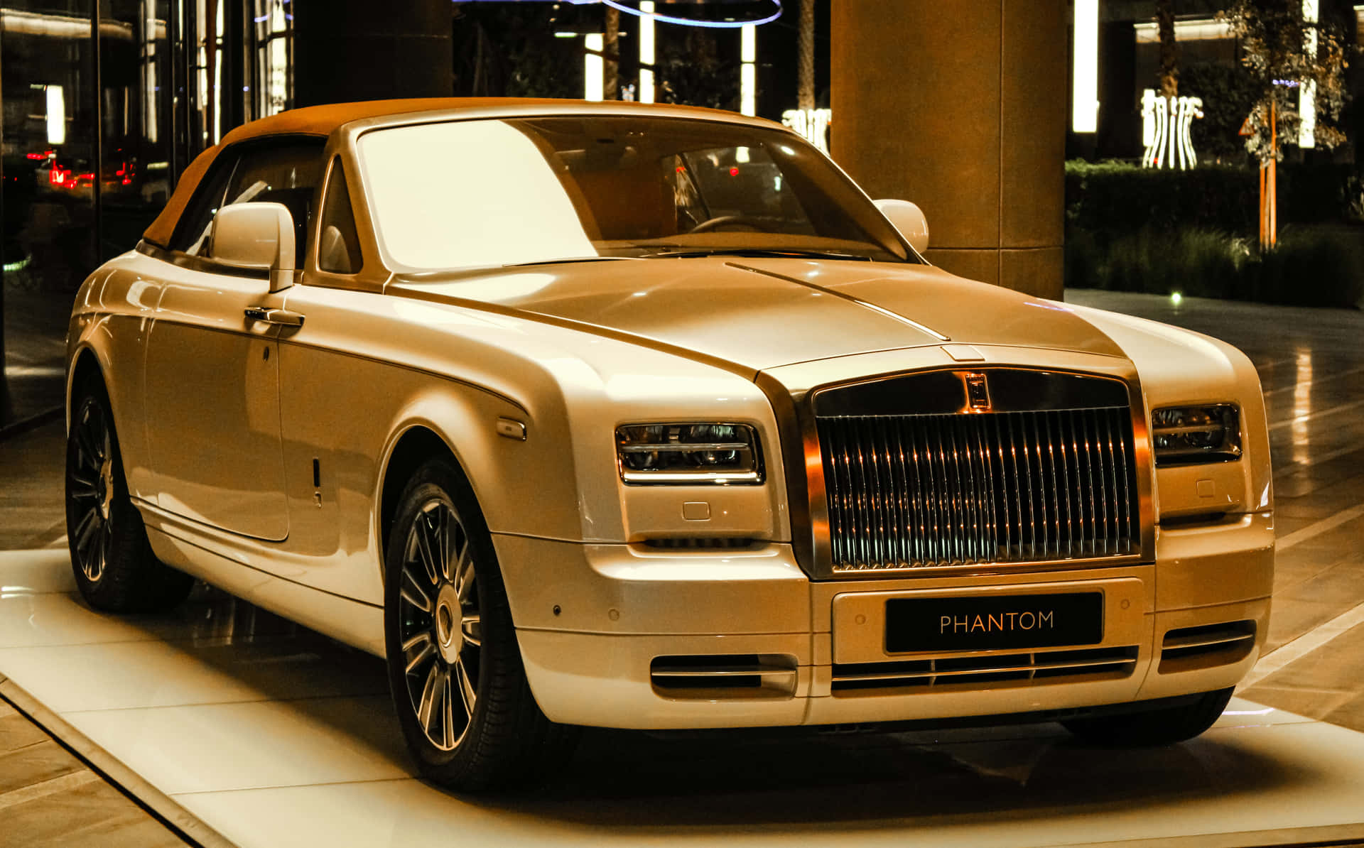 Luxurious Rolls-Royce on an Elegant Urban Road