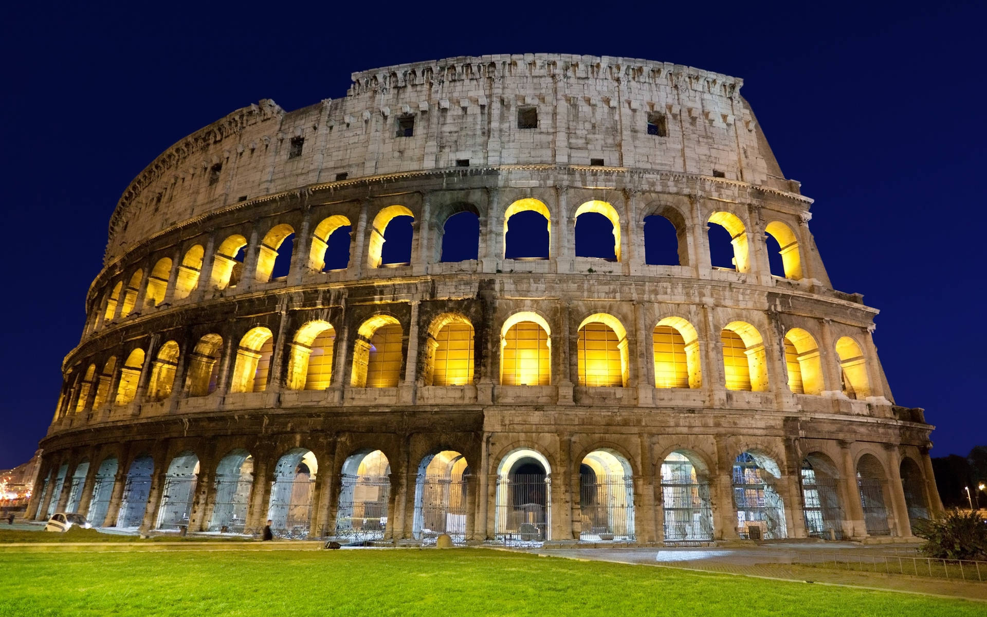 Roman Colosseum Beneath The Clear Night Sky Wallpaper