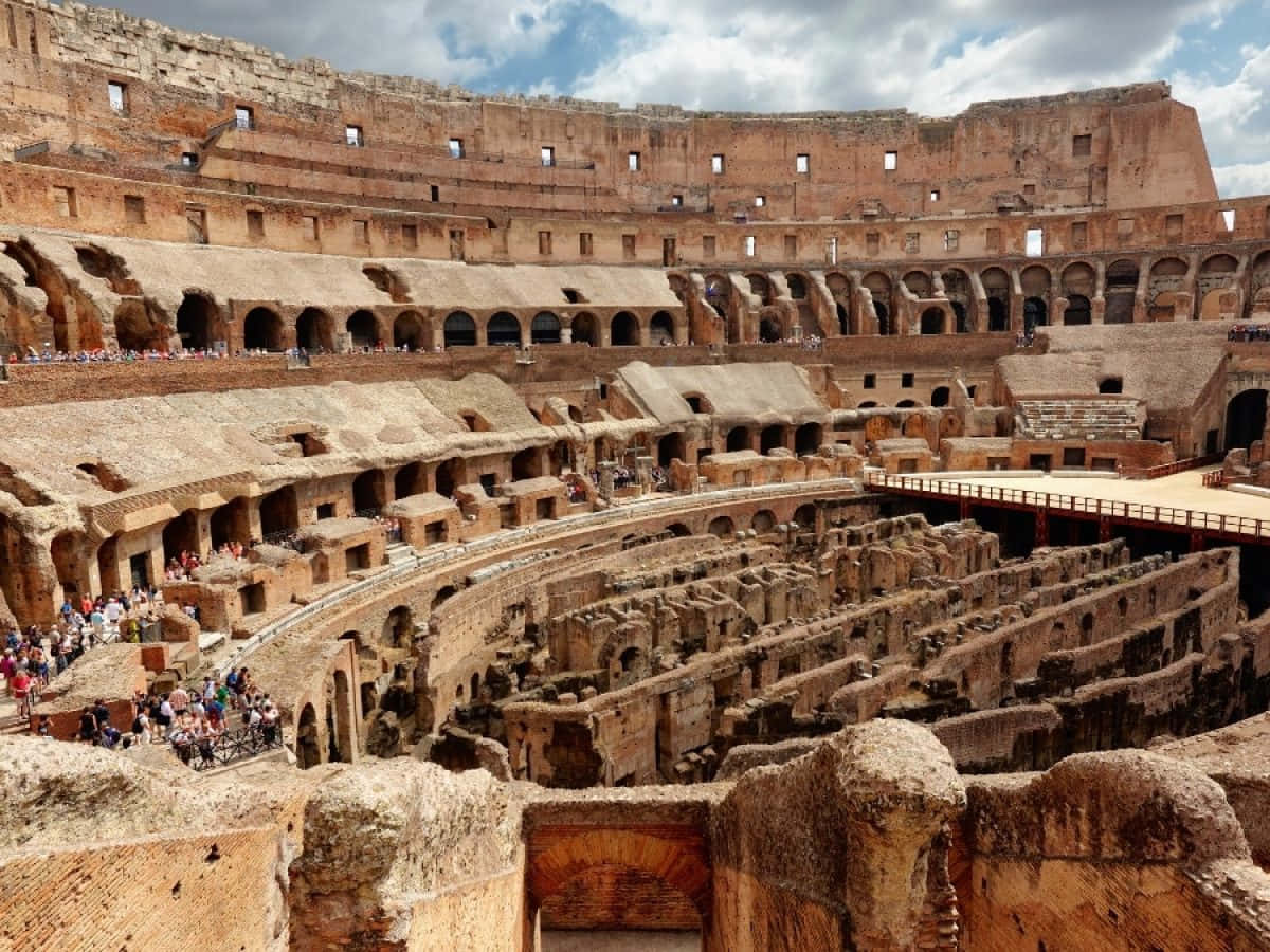 The iconic Roman Colosseum rising from the ruins.