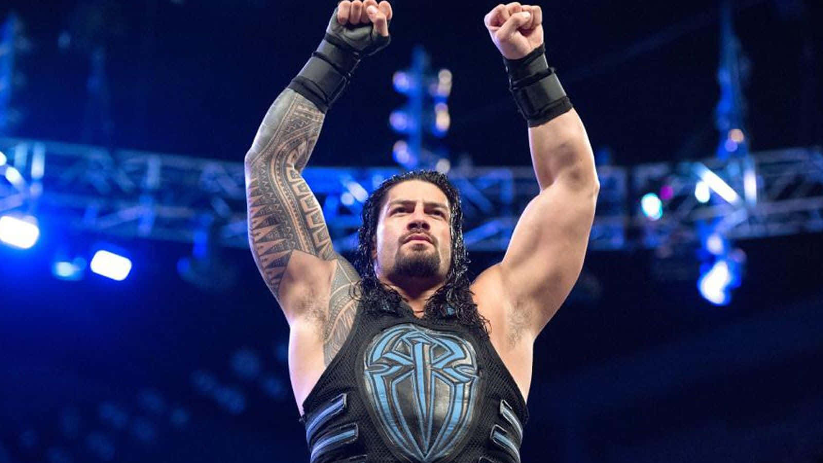 Roman Reigns prepares to enter the ring.