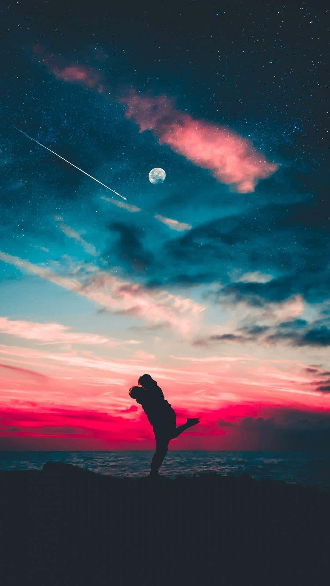 Blauerund Pinker Sonnenuntergang: Romantisches Hintergrundbild Für Paare