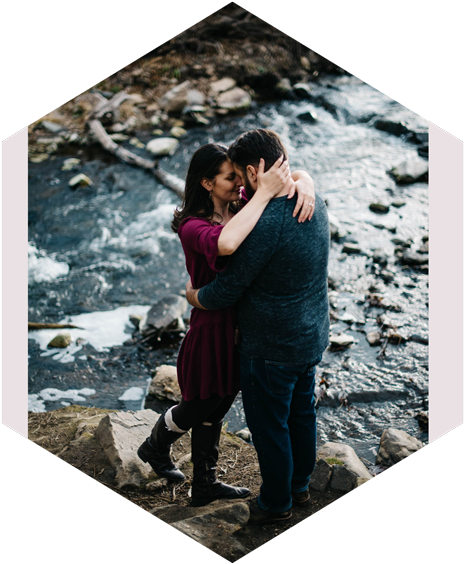 Romantic Couple Embrace Riverbank PNG