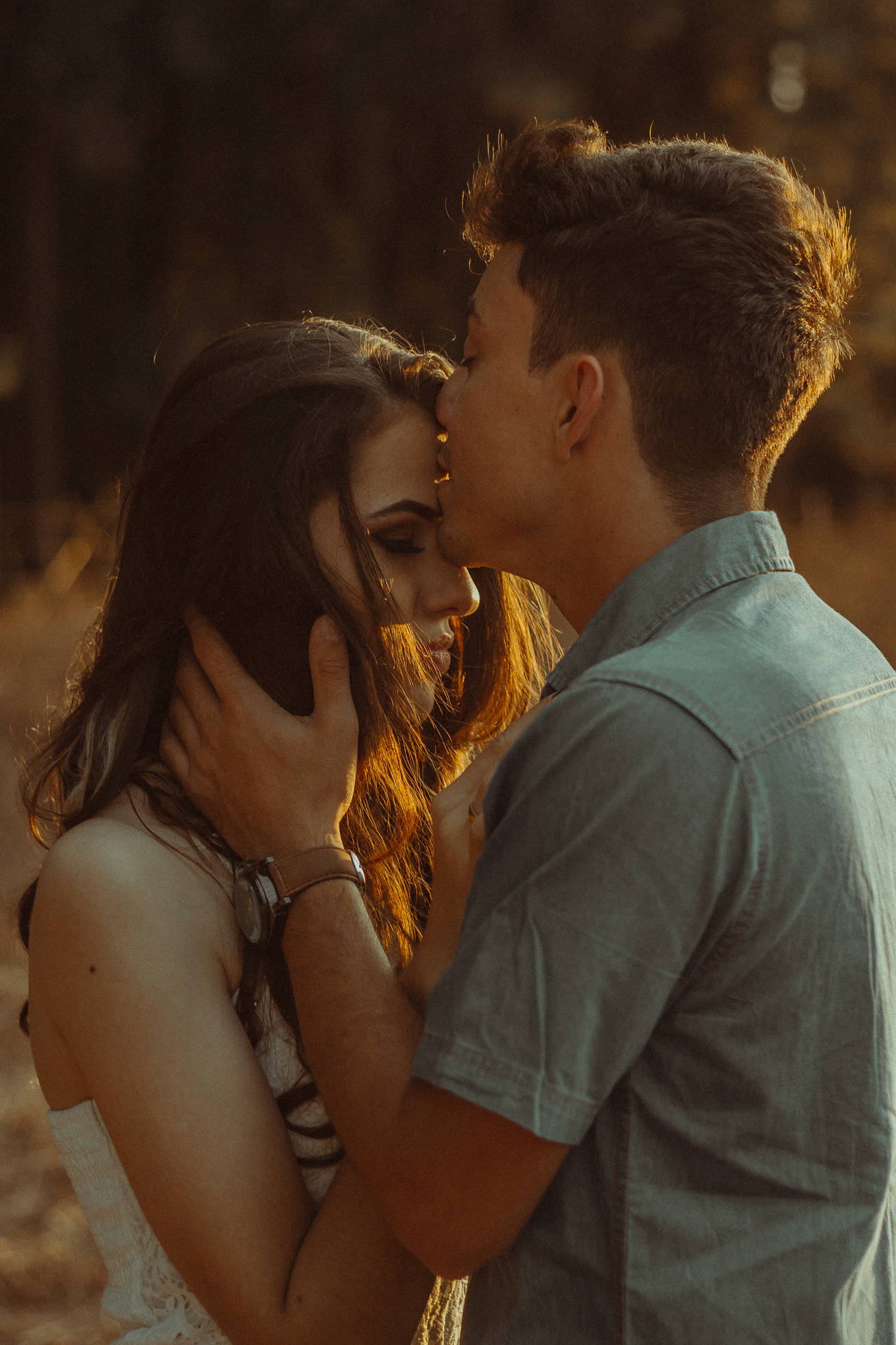 Download Romantic Couple Forehead Kiss