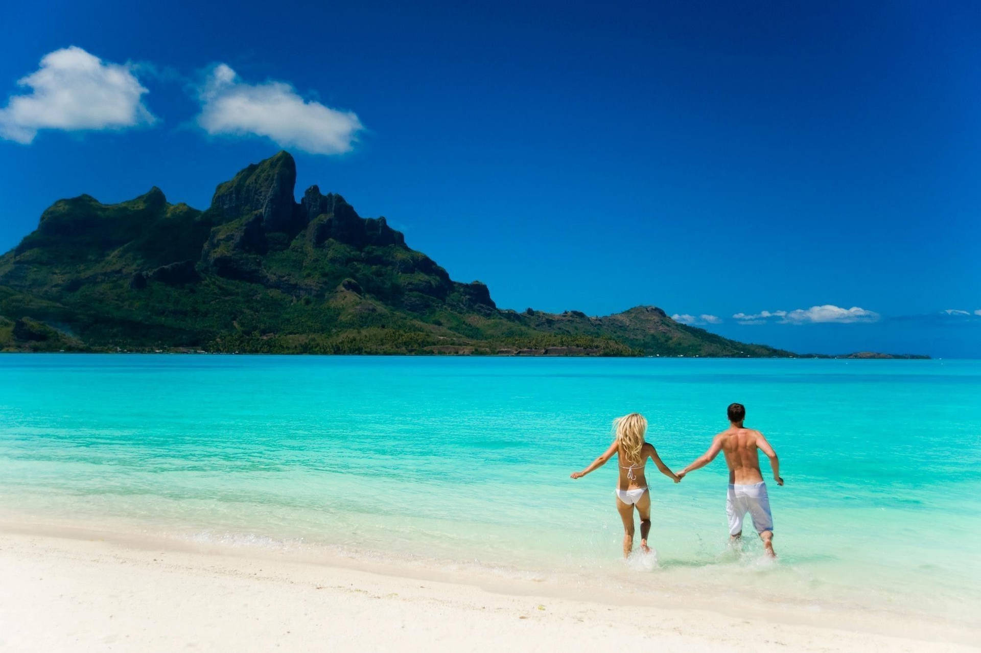 "romantic Getaway - Couple Enjoying Magical Beach Sunset" Wallpaper