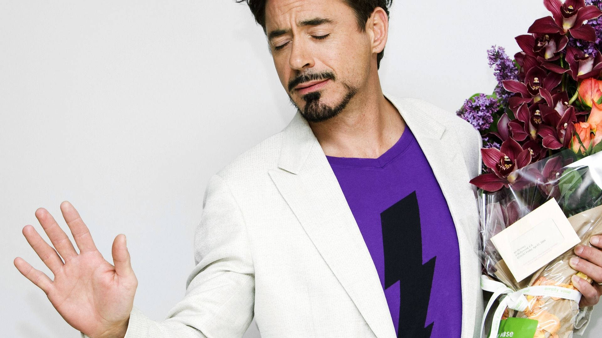Romantic Robert Downey Jr. In Purple Background