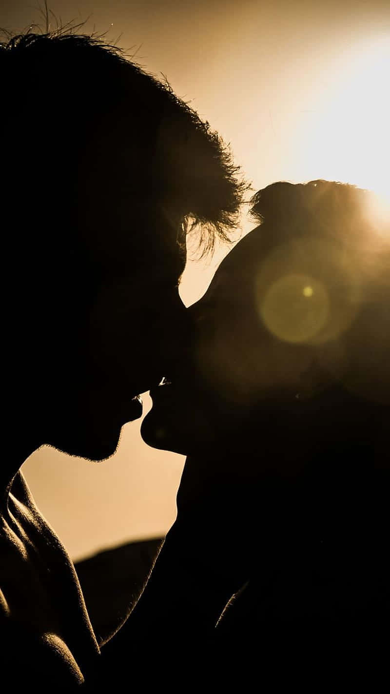 Romantic Silhouette Couple Sunrise Wallpaper