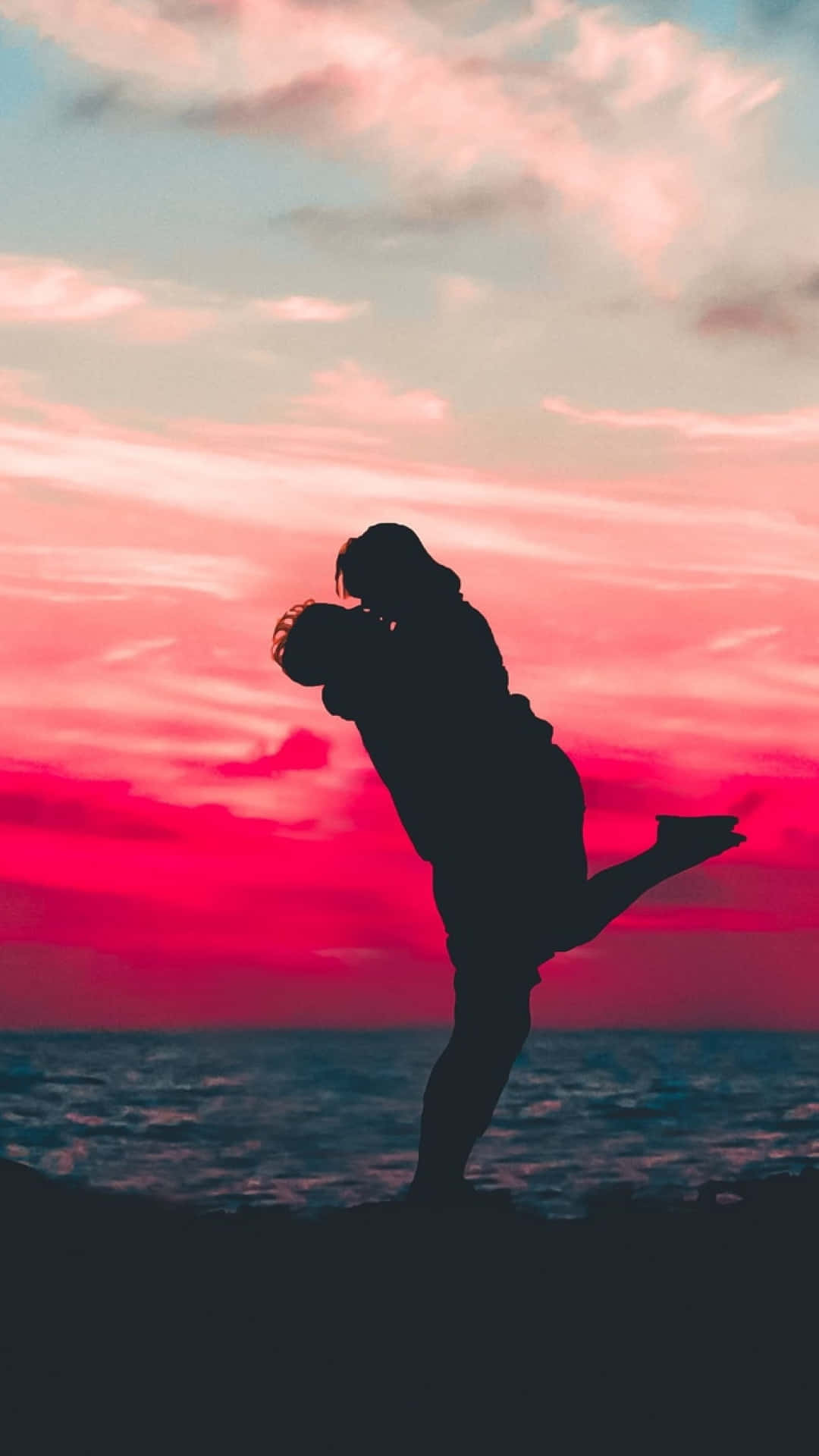 Romantic Sunset Embrace Wallpaper