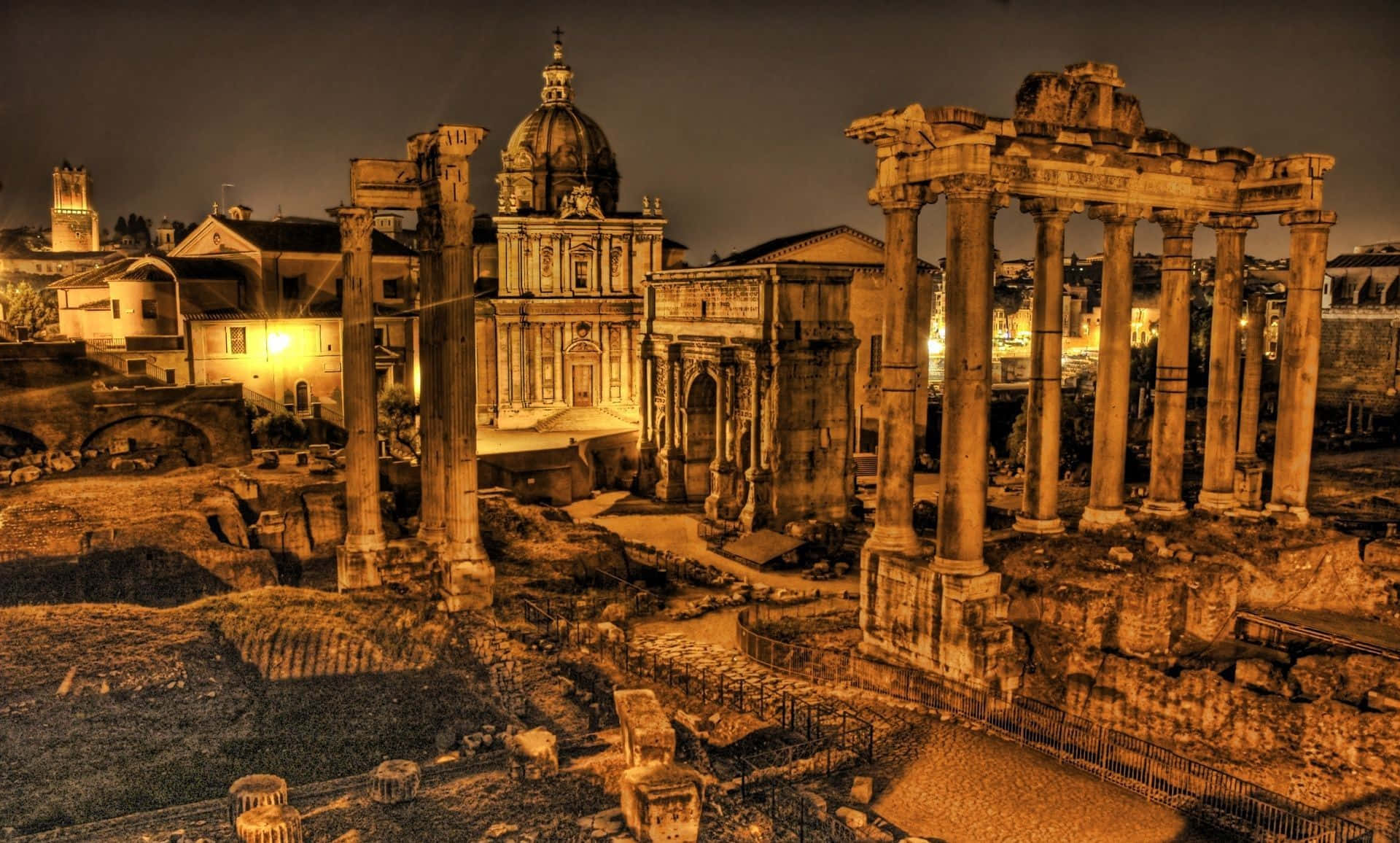 Vistadeslumbrante De Roma Iluminada À Noite.