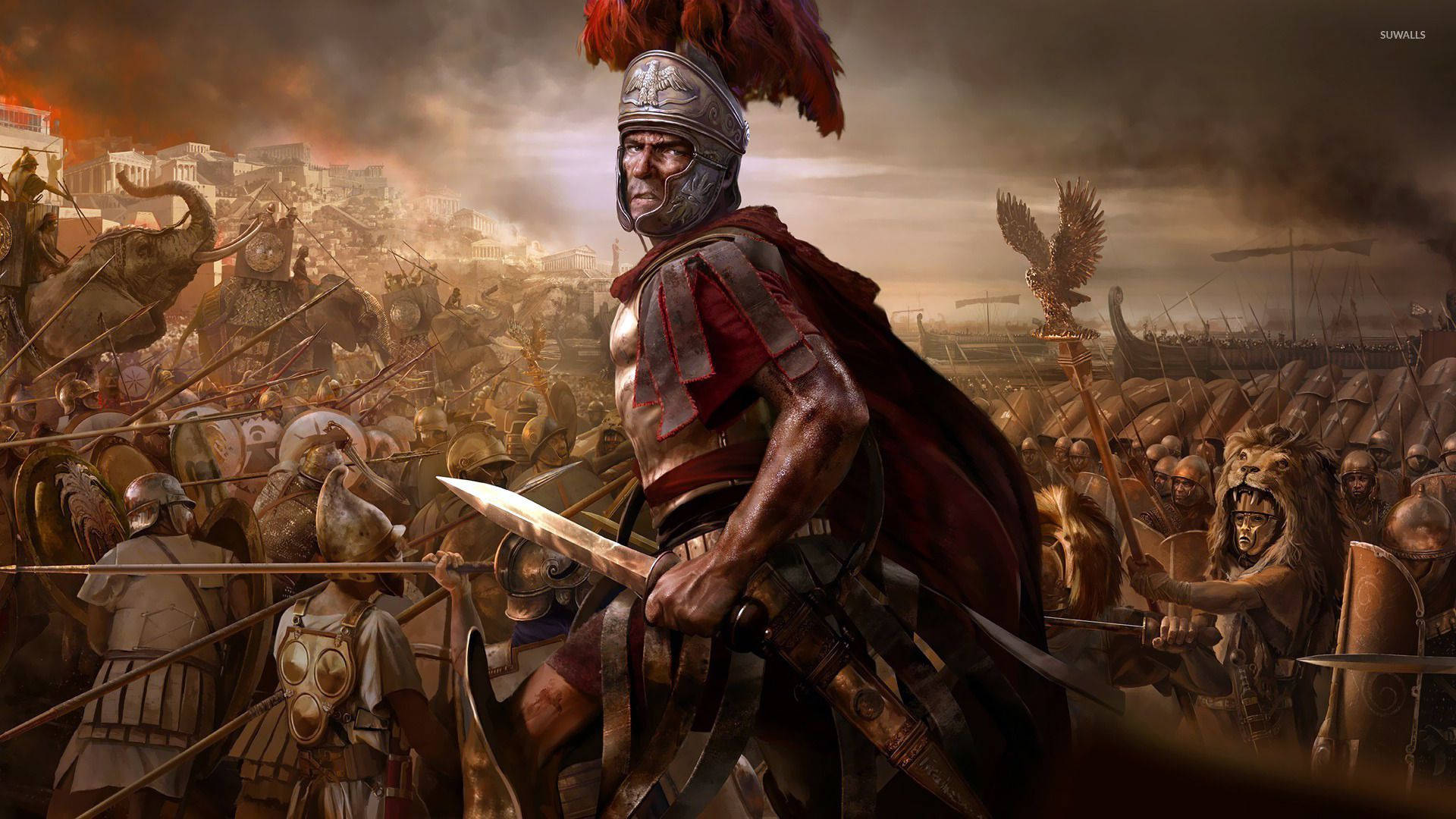 A Man In A Roman Costume Is Standing In Front Of A Crowd Wallpaper