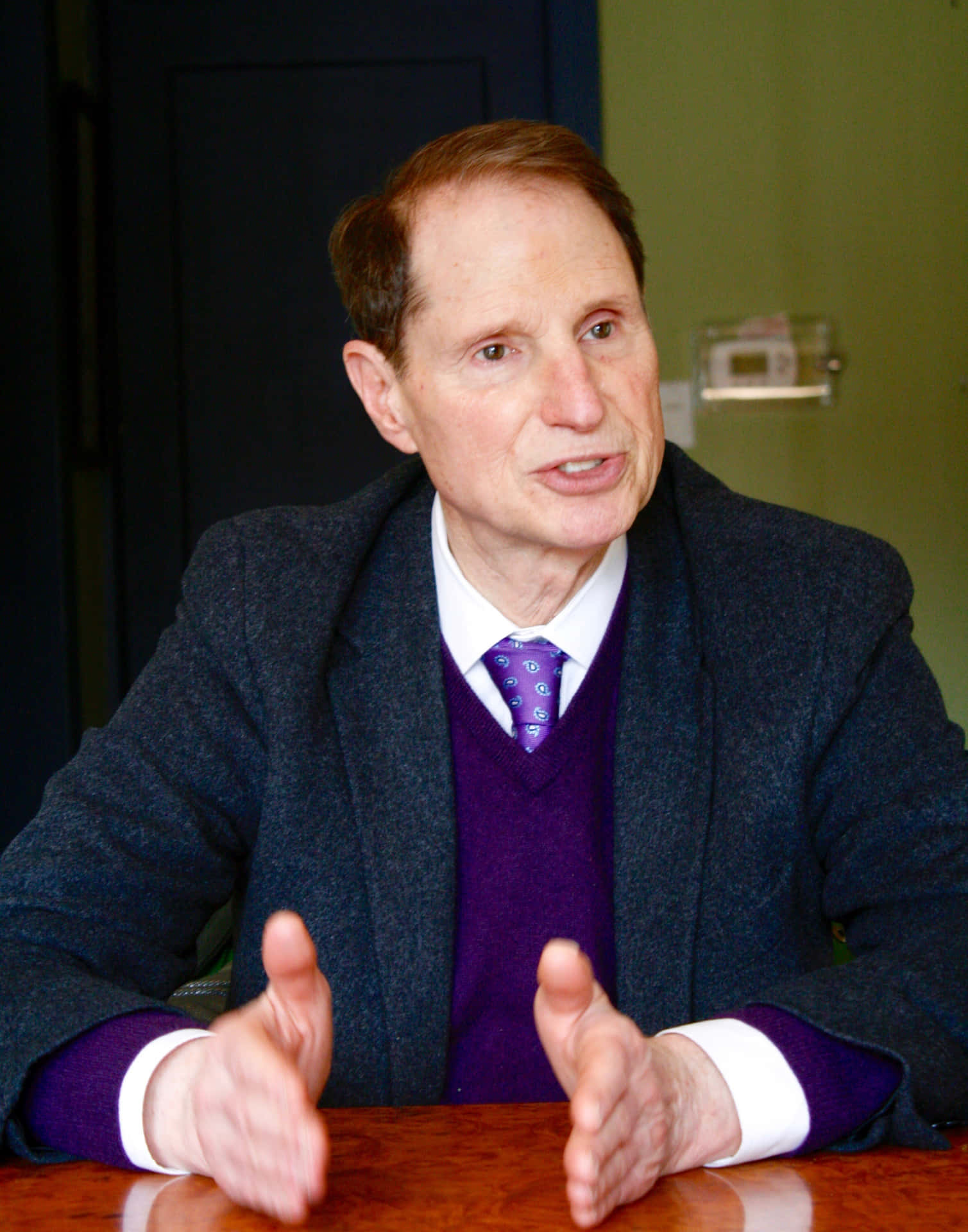 Ron Wyden With Purple Sweater Wallpaper