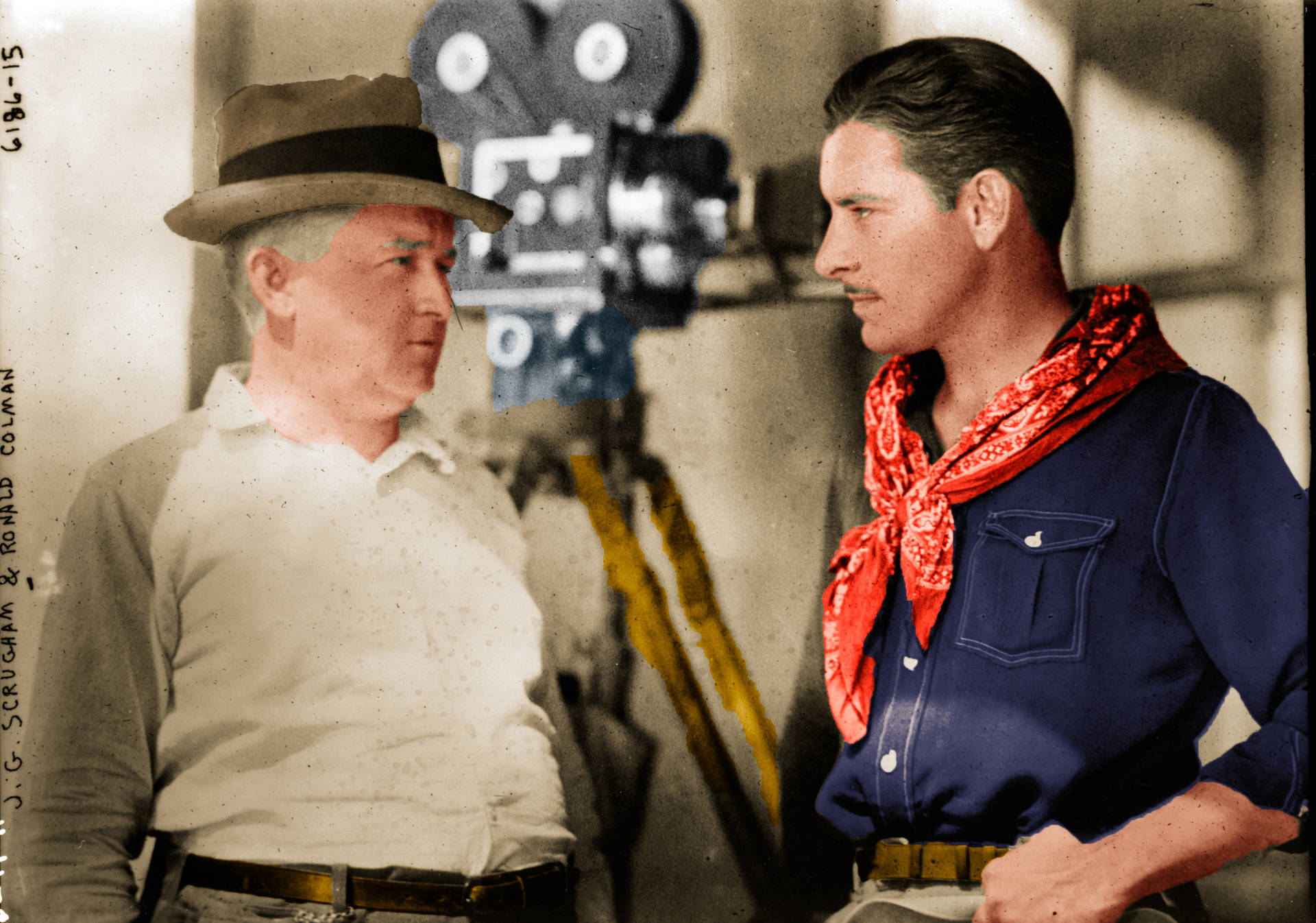 "Legendary actor Ronald Colman collaborating with a film director on a movie set" Wallpaper