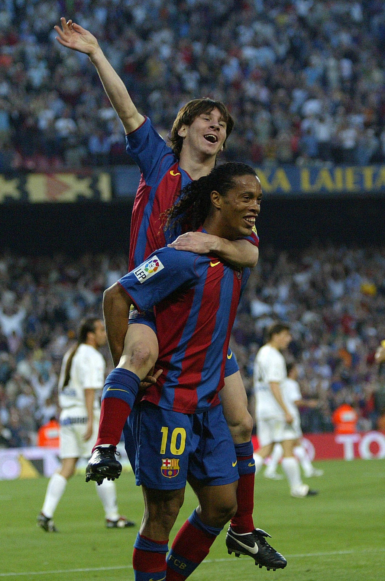 Ronaldinho With Leo Messi Wallpaper