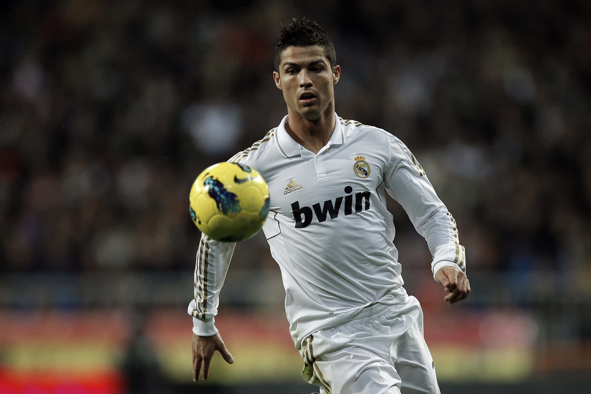 Cristiano Ronaldo launching a powerful goal attempt on the field