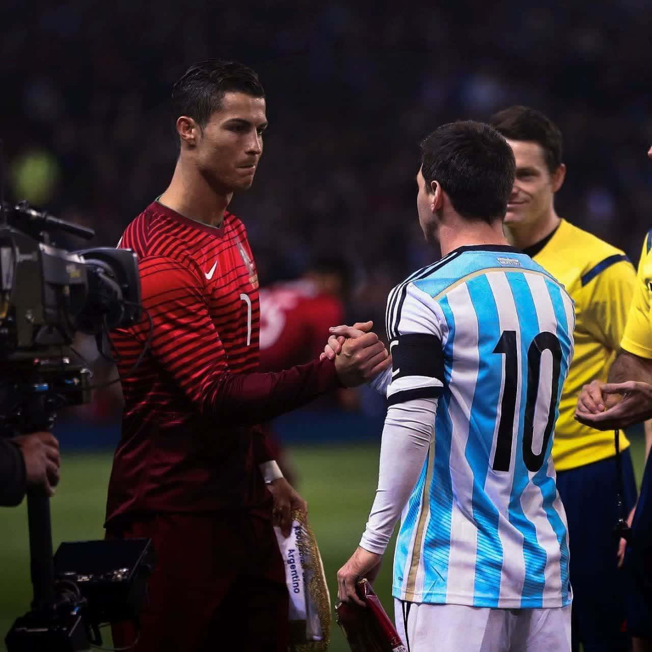 Download Ronaldo Messi Handshake Football Match Wallpaper | Wallpapers.com