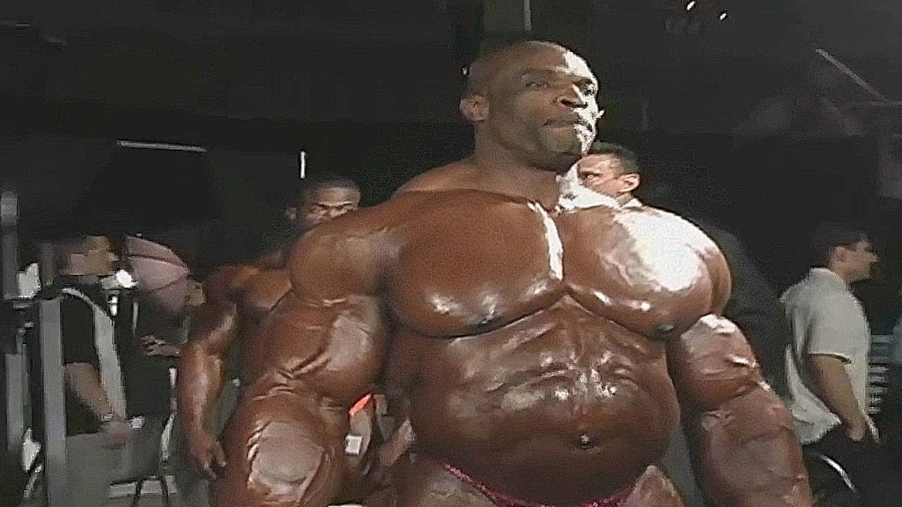 Ronnie Coleman Showing Off Tanned Body Wallpaper