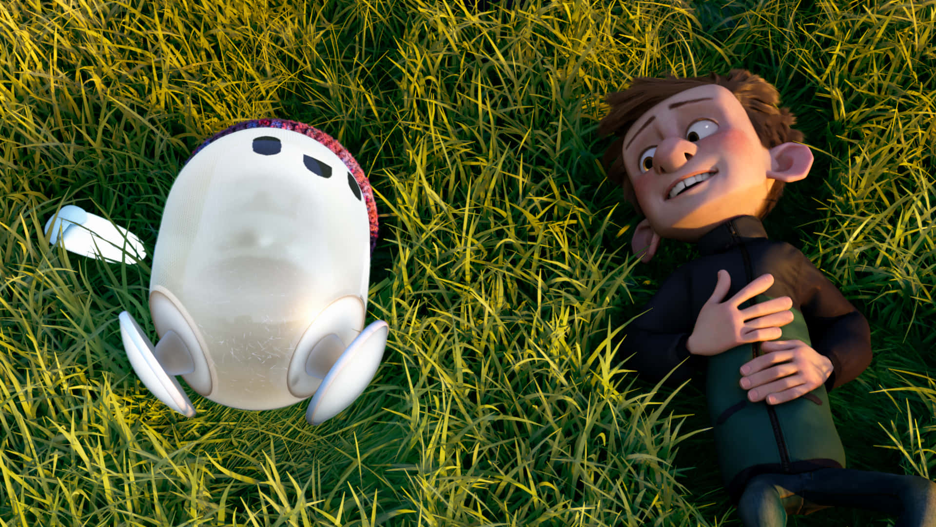 En mand og en hvid robot, ligge i græsset ved siden af et slot. Wallpaper