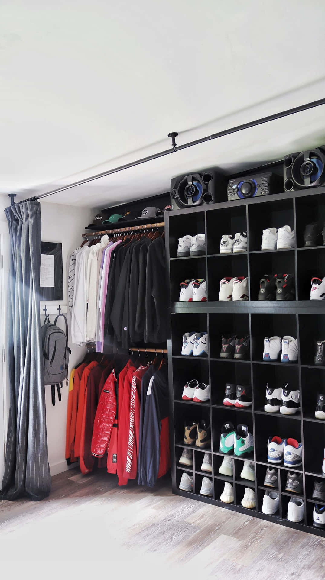 A Closet With A Lot Of Shoes