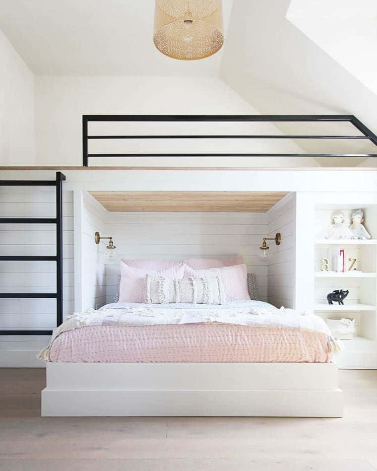 A White And Pink Bedroom With A Loft Bed