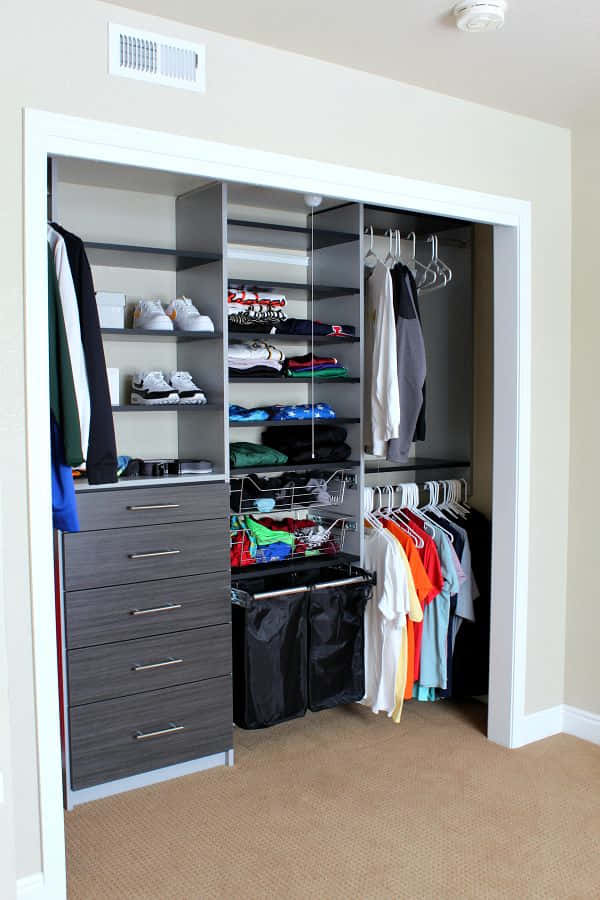A Closet With Clothes And Shoes In It