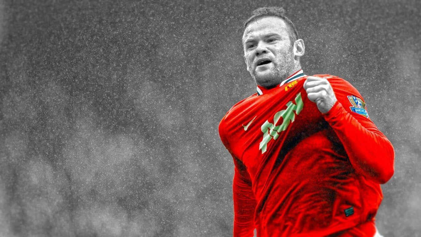 Immaginedi Wayne Rooney Con La Maglia Rossa Brillante.