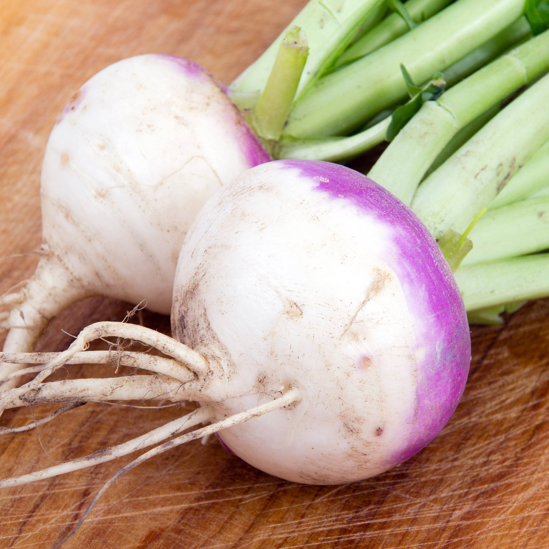 Rooted Turnips On Chopping Board Wallpaper