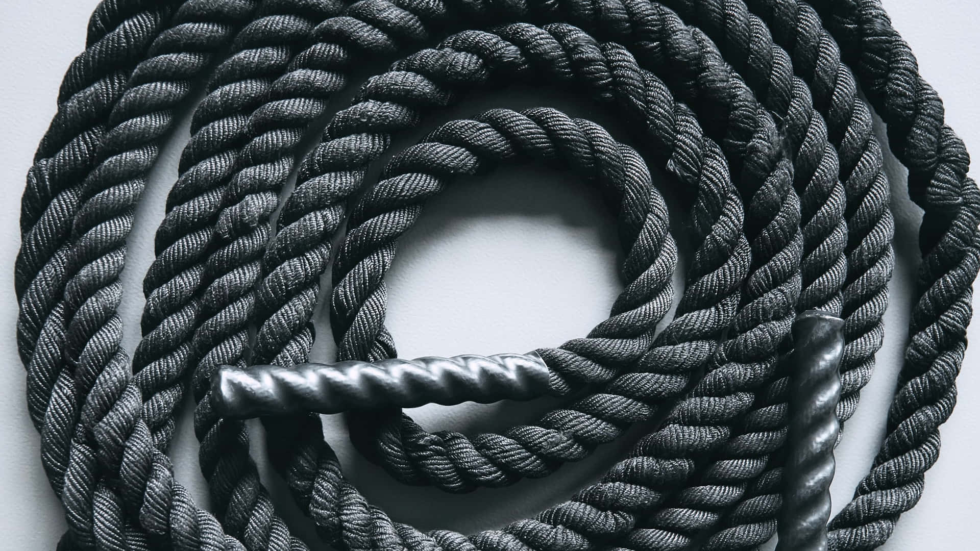 "Sturdy Rope on Wooden Surface"