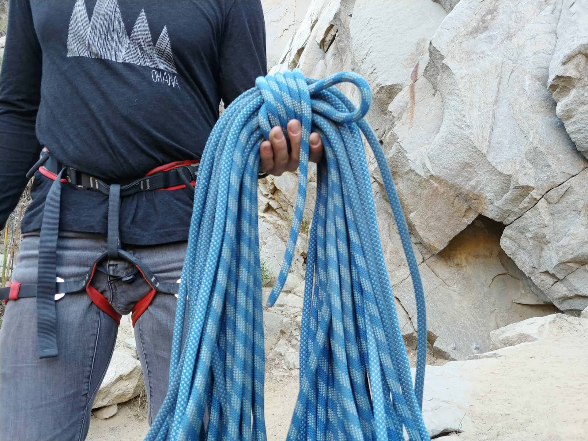 Man Holding A Blue Rope Picture