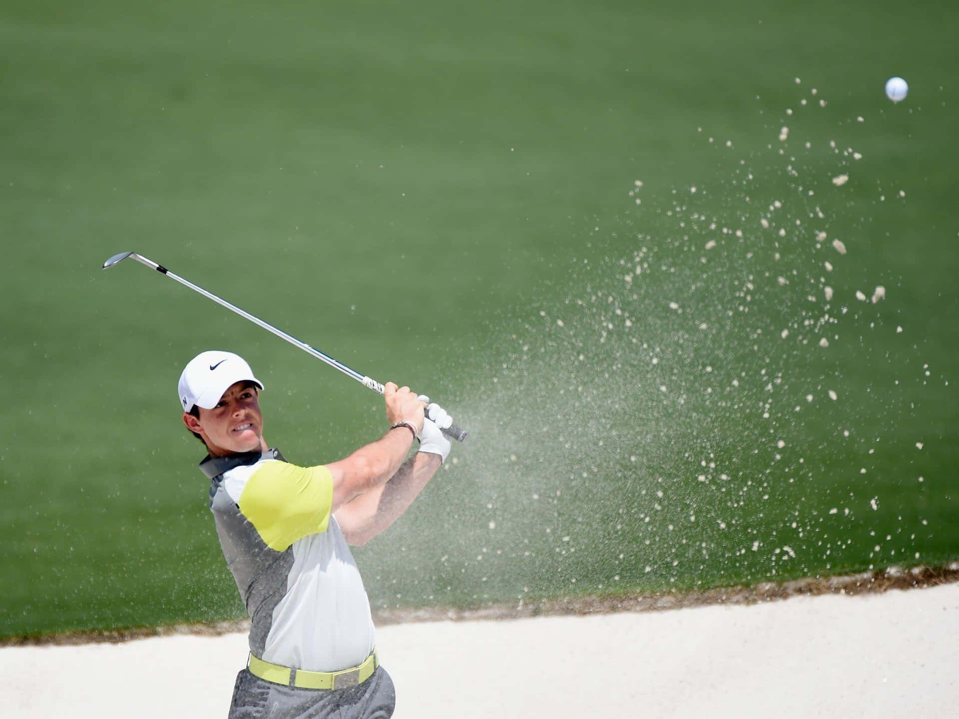 "Chasing Perfection: Rory Mcilroy Prepares for His Next Golf Shot" Wallpaper