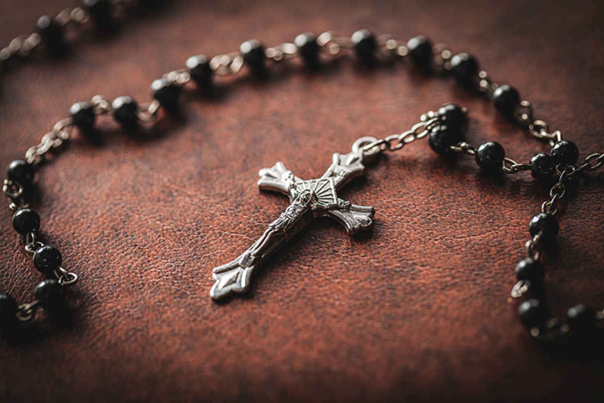 Rosary On A Leather Surface Picture