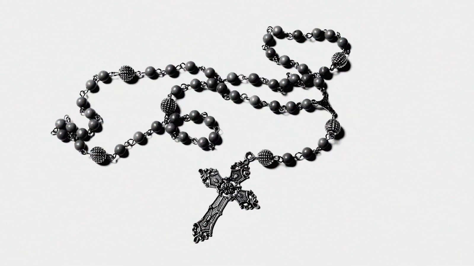 Rosary On A White Picture