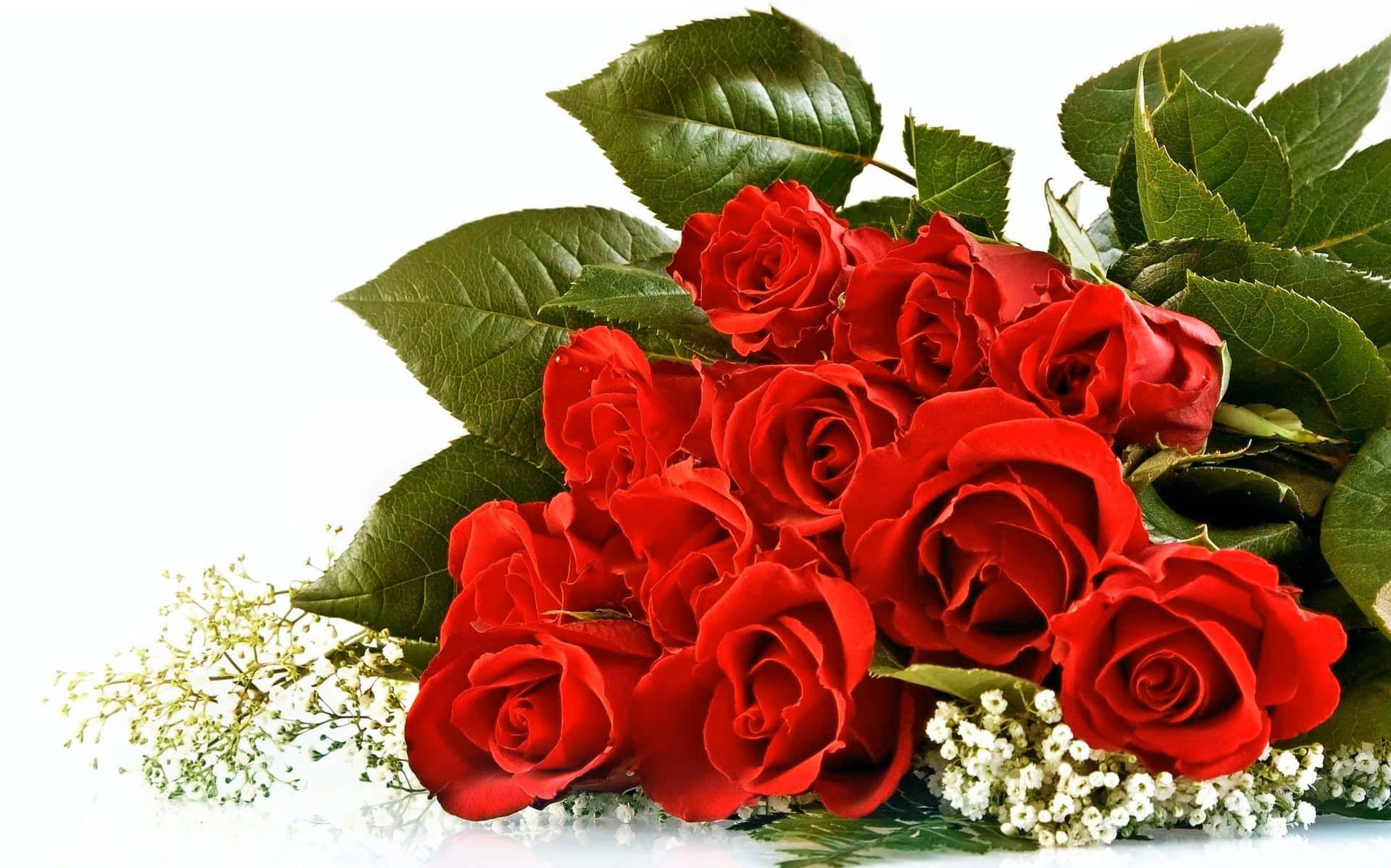 Immaginidi Bouquet Di Rose Con Foglie Verdi