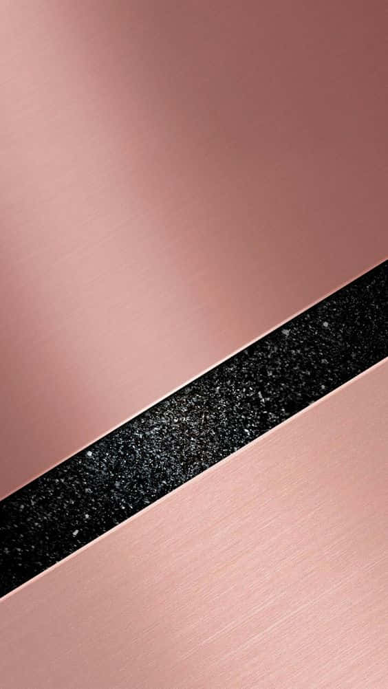 A Close Up Of A Rose Gold Surface Wallpaper
