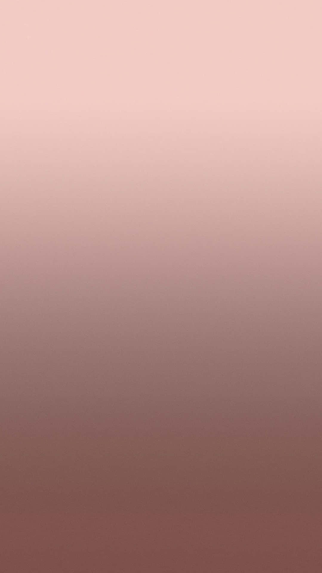 A Pink And Brown Gradient Wallpaper Wallpaper