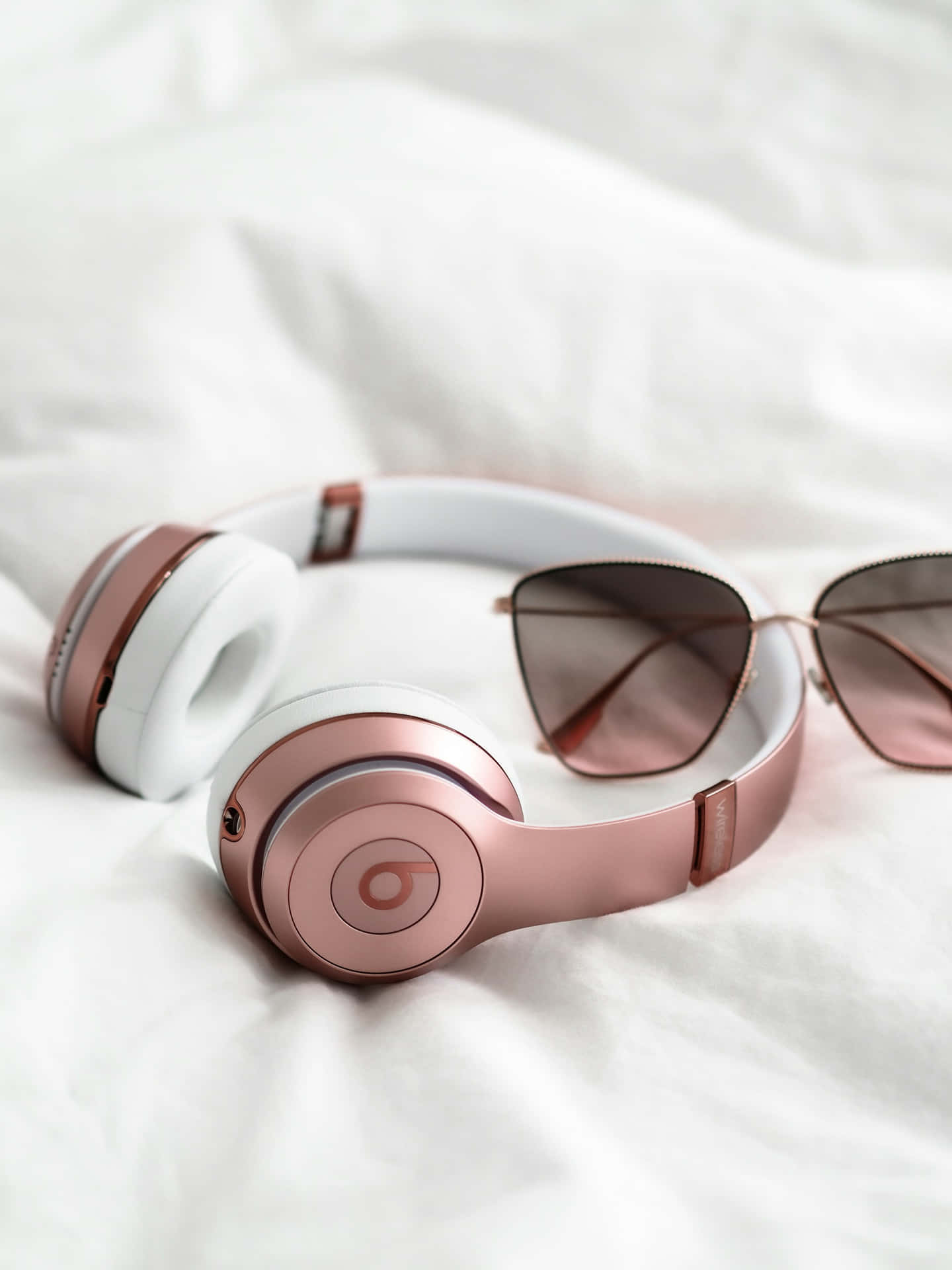 Rose Gold Headphonesand Sunglasses Pastel Aesthetic Wallpaper