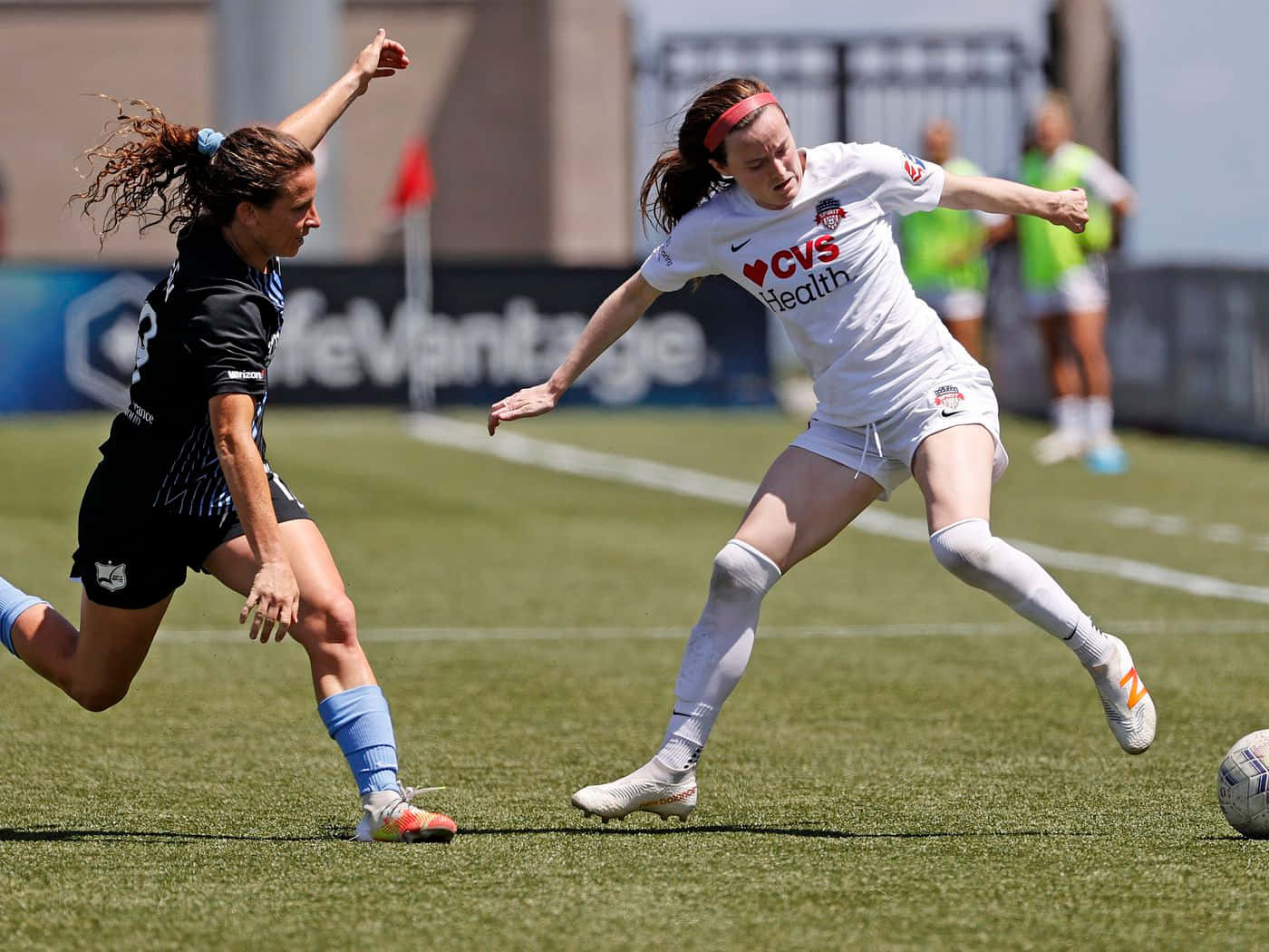 Rose Lavelle In Action On The Soccer Field Wallpaper